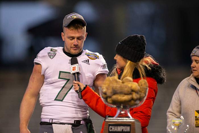 Dec 20, 2022; Boise, Idaho, USA; Eastern Michigan Eagles quarterback Taylor Powell (7) speaks with ESPN on air talent Dawn Davenport was chosen as the MVP of the Famous Idaho Potato Bowl against the San Jose State Spartans at Albertsons Stadium. Eastern Michigan beats San Jose State 41-27. Mandatory Credit: Brian Losness-USA TODAY Sports